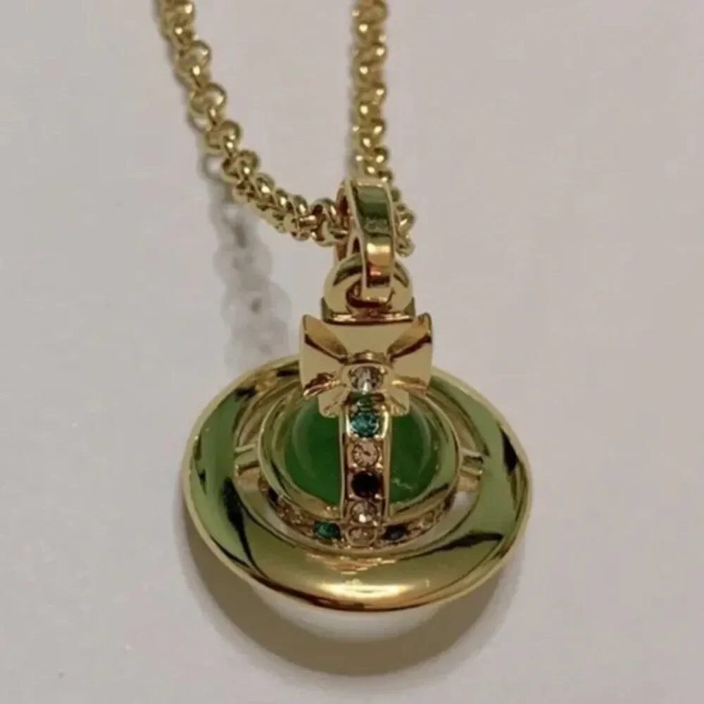 NIB Vivienne Westwood gold petite Saturn orb green crystal chain necklace